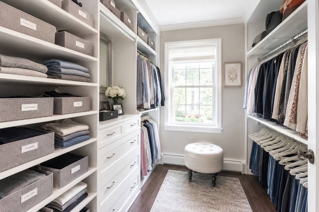 Organized walk-in closet system in a New Jersey home by OCD Organized